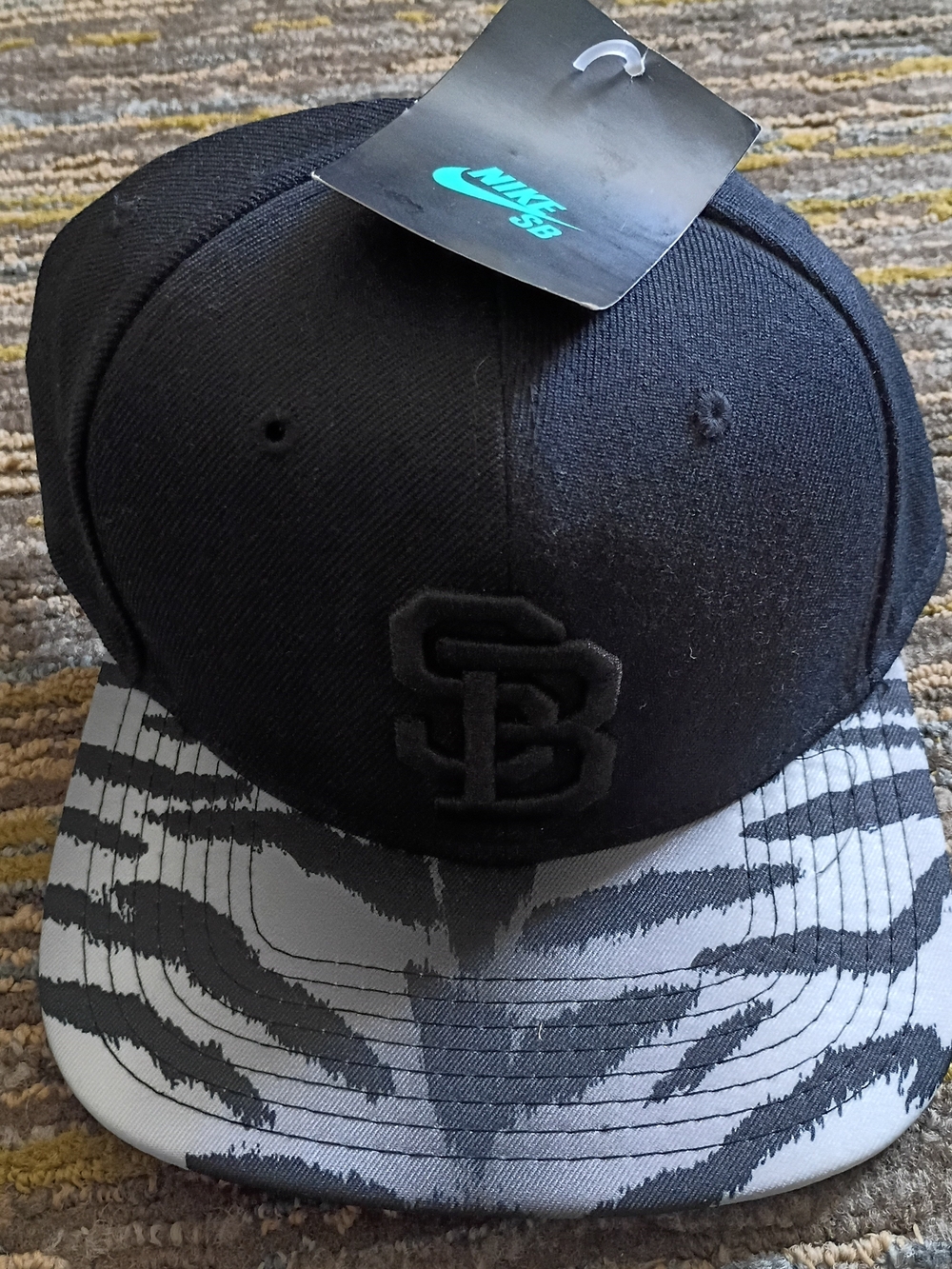 Nike SB Black Snapback Cap with Gray Tiger Brim